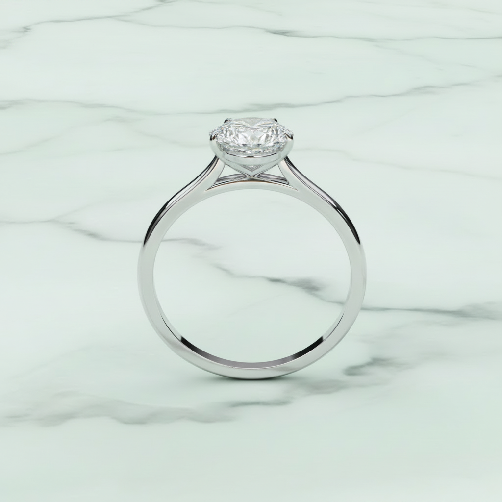 Silver ring with a diamond on a white background